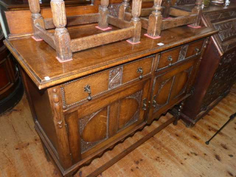 1920's/30's carved oak two door sideboard on barley twist legs