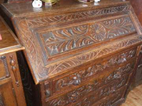 Victorian heavily carved oak three drawer bureau