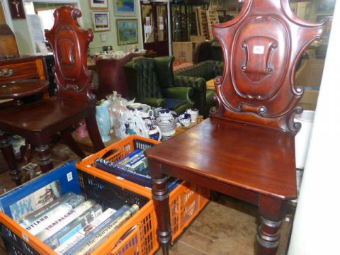 Pair Victorian mahogany carved shaped back hall chairs