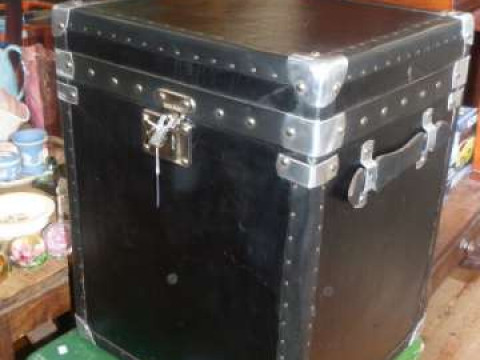 Studded black leather two handled trunk