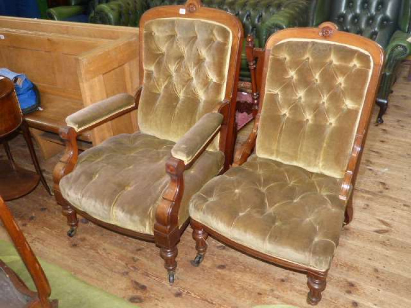 Pair Victorian mahogany lady's and gent's chairs in deep buttoned fabric
