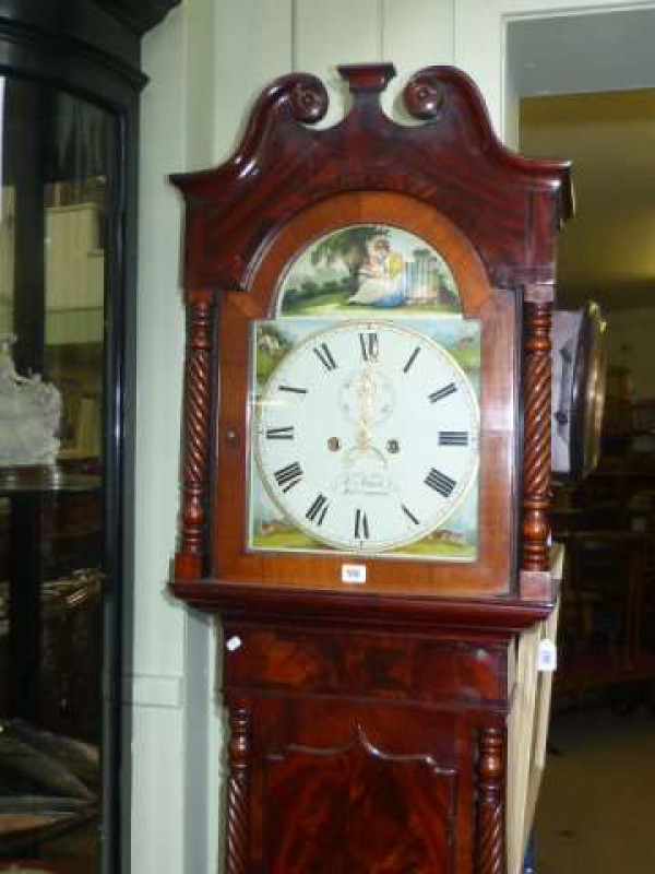 Antique mahogany and rope twist cased eight day longcase clock having painted arched dial