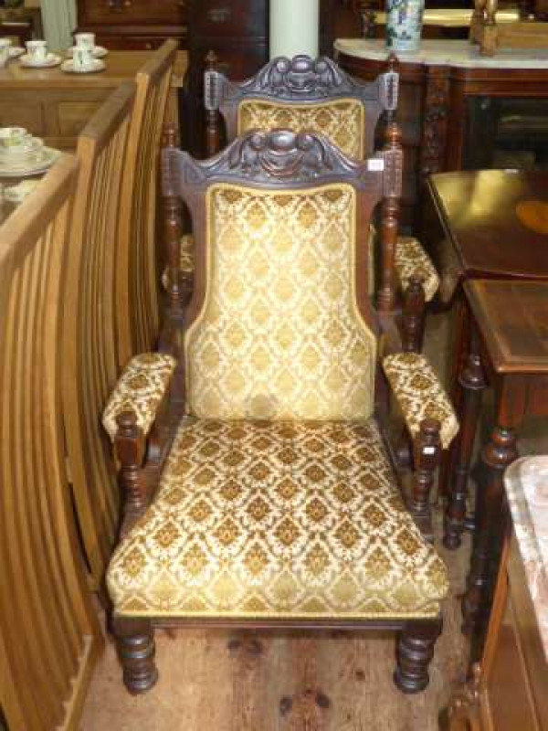 Pair of carved Victorian parlour armchairs