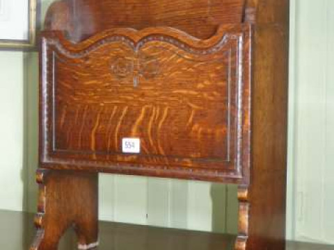 Titchmarsh and Goodwin carved oak two division magazine rack