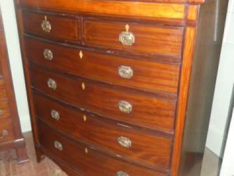 19th Century inlaid mahogany bow front chest of two short above four long...
