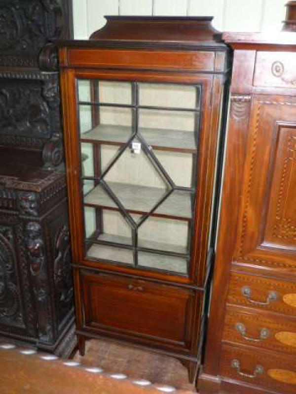 Edwardian mahogany and satinwood crossbanded china cabinet having single astragal glazed door above a fall front magazine compartment