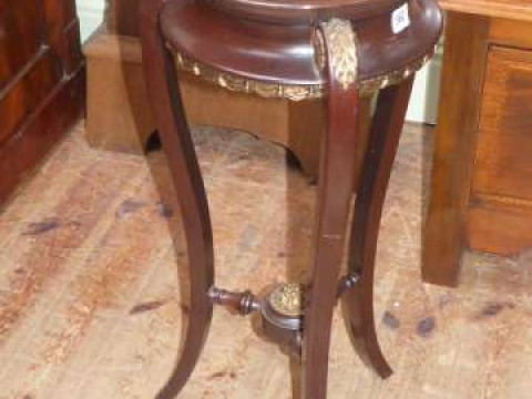 Circular mahogany and gilt ormolu mounted three legged plant stand