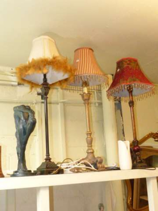 Three modern table lamps and shades and plaster Goddess figure