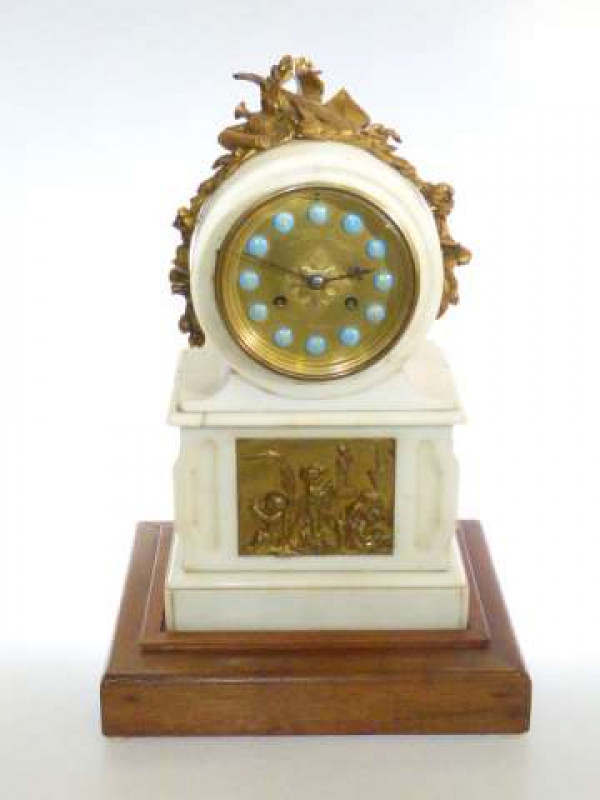 Victorian alabaster mantel clock with gilt metal plaque and mount on mahogany base