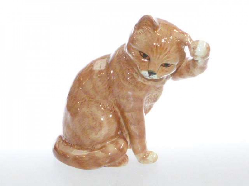 Beswick model of a cat, no. 1877, ginger swiss roll