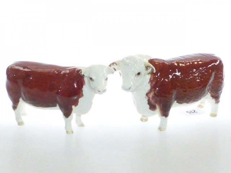 Beswick model of a Hereford Bull, no. 1363A; and a Beswick model of a Hereford cow, No. 1360 (2)
