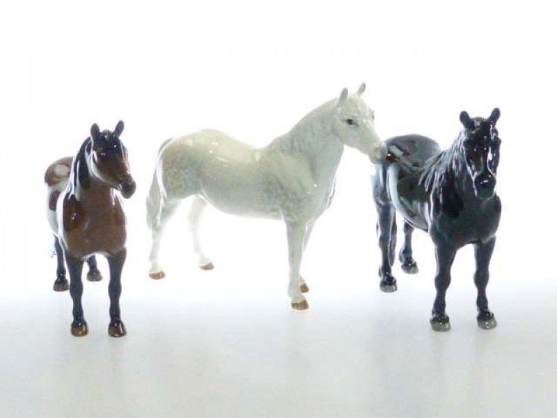 Beswick model of a Connemara pony, No. 1641, grey; Beswick model of a Dartmoor pony, no. 1642, brown; and a Beswick model of a Fell pony, no. 1647 (3)