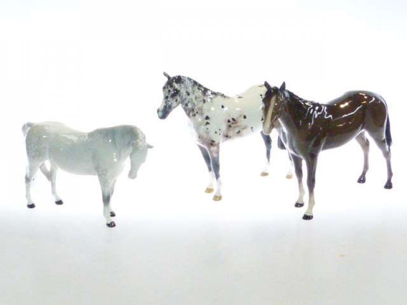 Beswick model of a Mare, no. 1991, first version, grey; Beswick model of an Appaloosa Stallion, no. 1772; and a Beswick model of a racehorse, no. 1564, brown (3)