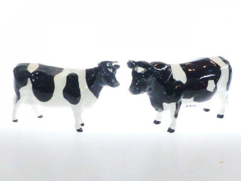 Beswick model of a Fresian Bull, no. 1439A; and a Beswick model of a Fresian Cow, no. 1362A (2)