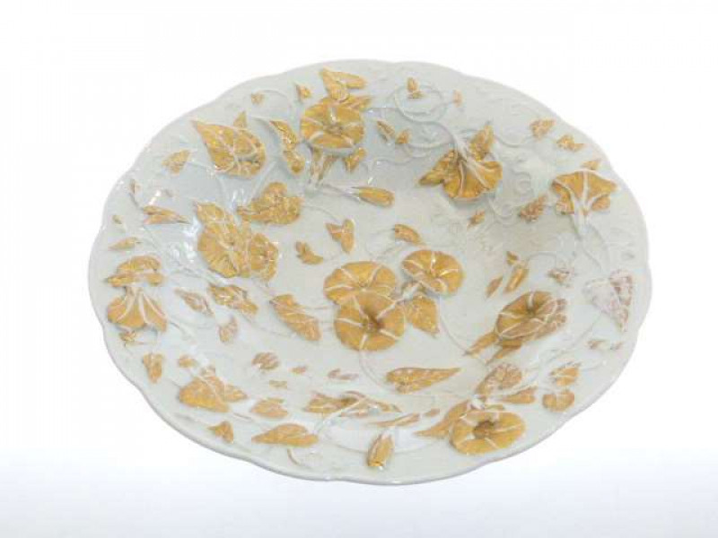 Continental gilded porcelain bowl, underglaze blue crossed swords