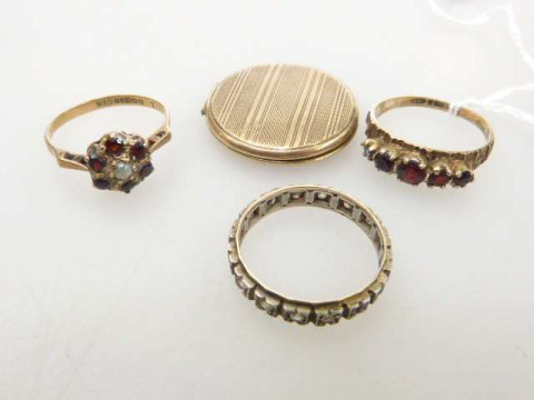 Two 9ct gold rings, 9ct gold pendant locket and a band stamped 9CT (4),...