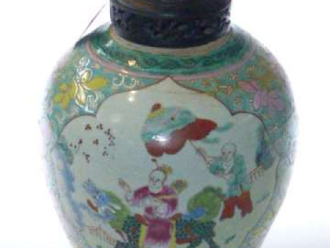 Chinese Famille Rose vase with pierced wooden cover