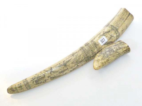Reproduction decorated faux tusk and a similarly decorated faux whales...