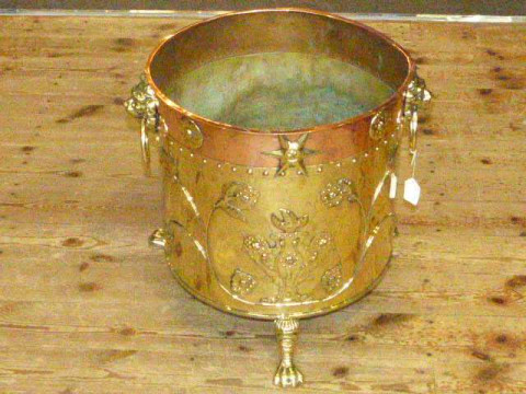 Late Victorian brass and copper log bin with lion mask ring handles