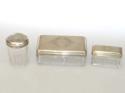Three Russian silver topped toilet jars