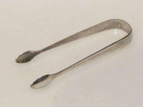 Pair Georgian silver bright cut sugar tongs