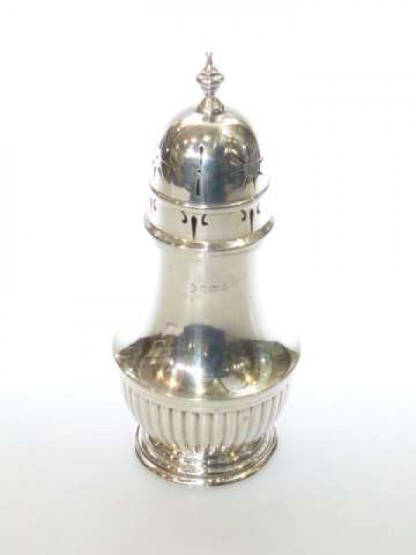 Edwardian silver caster with part fluted body