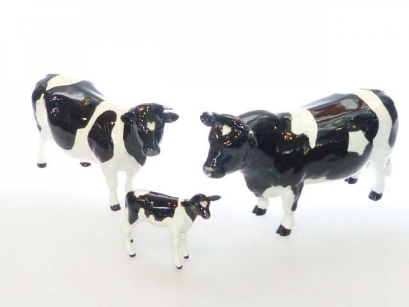 Beswick fresian bull, Ch. Coddington Hilt bar cow, Ch. Claybury Leegwater; and calf (3)