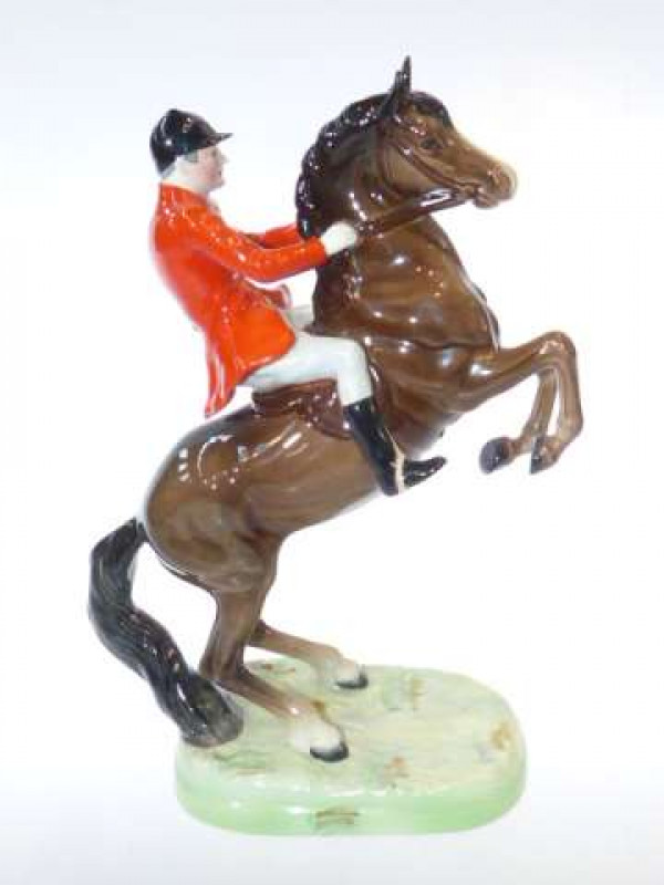 Beswick model of a Huntsman on rearing horse, no. 868, second version, brown