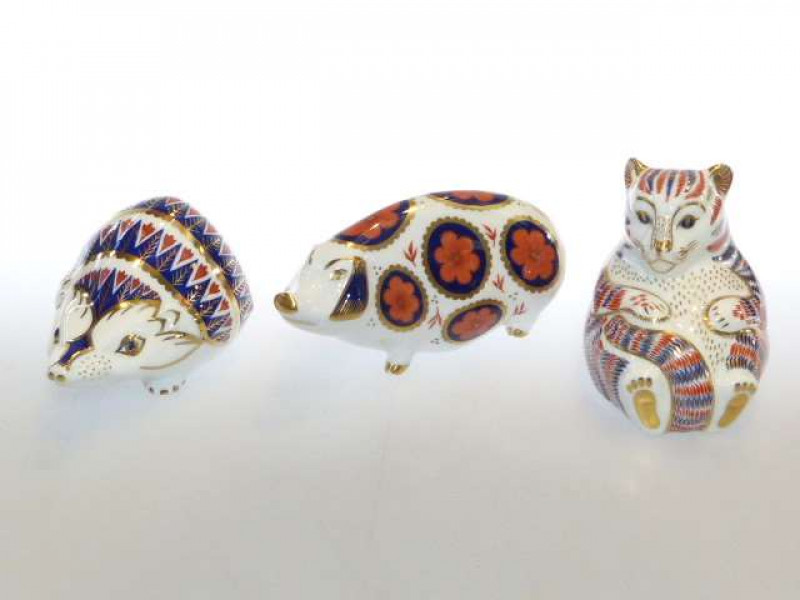 Three Royal Crown Derby paperweights (one with gold stopper)