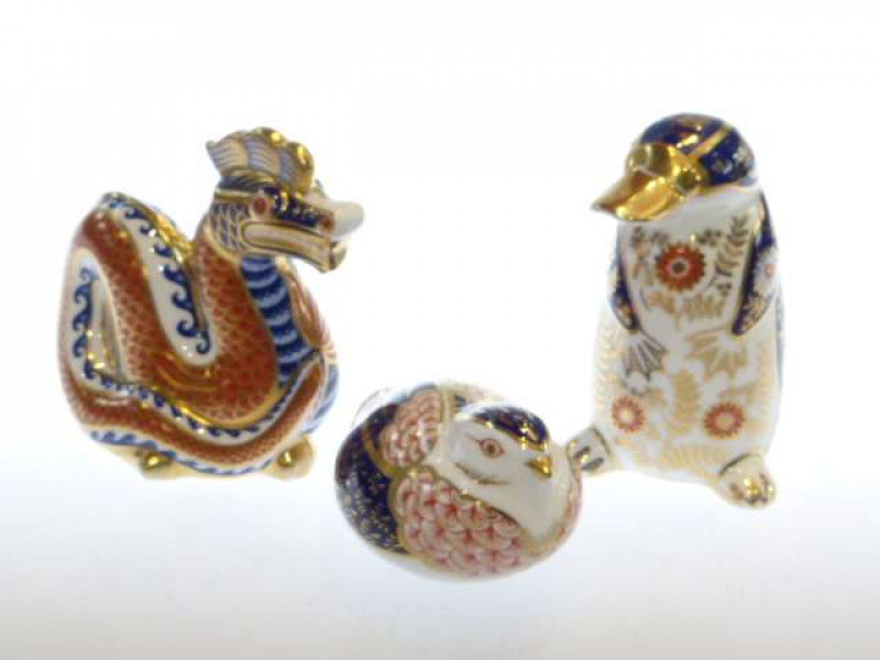 Three Royal Crown Derby paperweights (each with gold stopper)