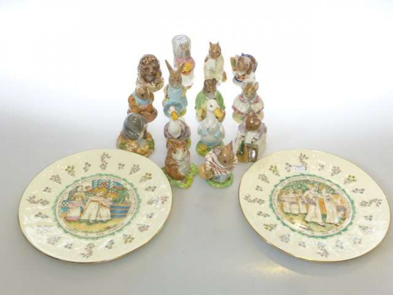 Collection of fourteen Beswick Beatrix Potter figures, brown factory marks; and a pair of Royal Doulton Kate Greenaway plates