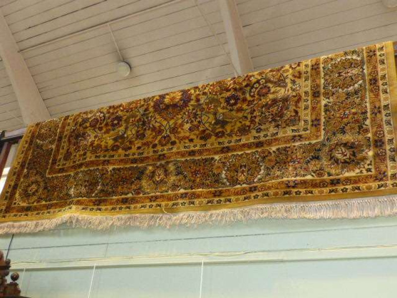 Gold ground wildlife and floral pattern carpet 3.55 x 2.75