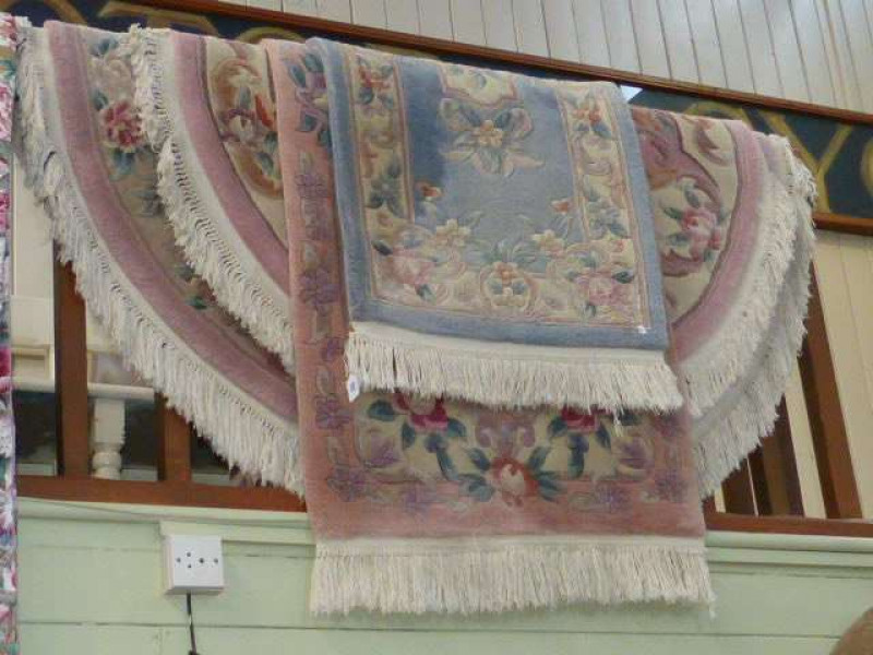 Four various Chinese rugs