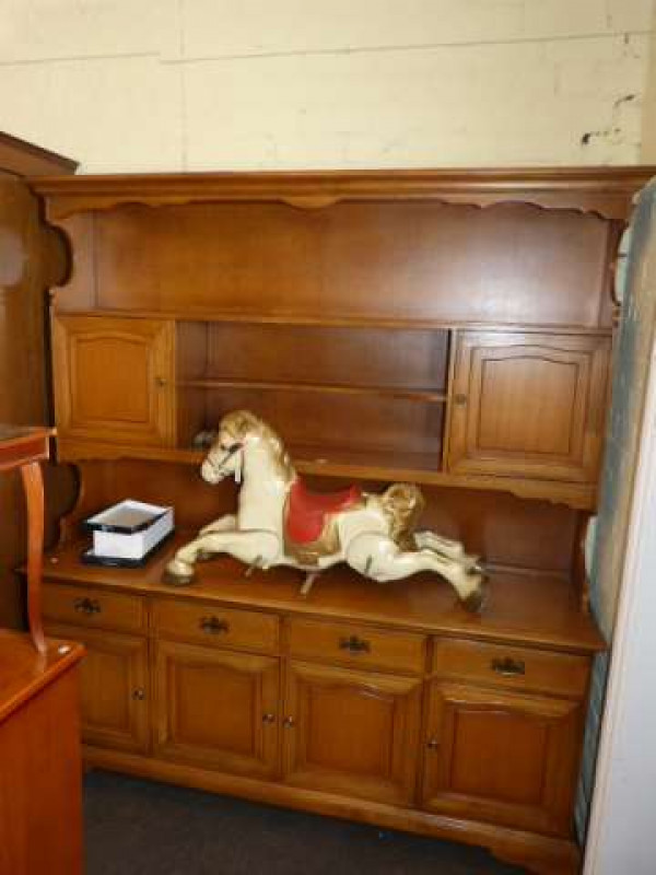 Stag shelf and cupboard back four door dresser