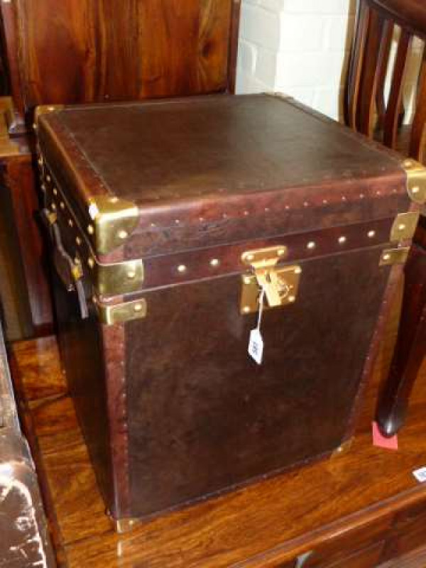 As new leather and metal bound trunk