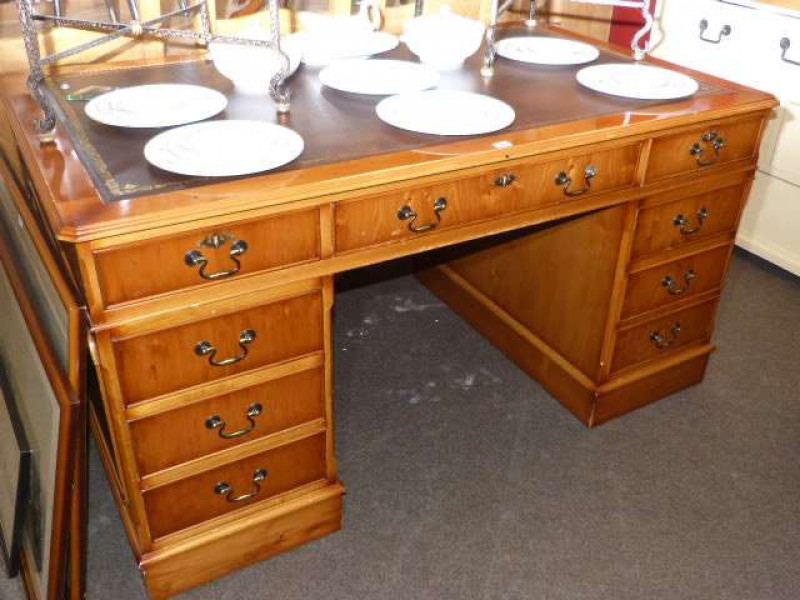 Yew eight drawer pedestal desk