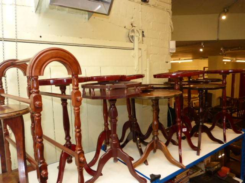 Collection of fourteen tripod wine tables, towel stand and plant stand (16)