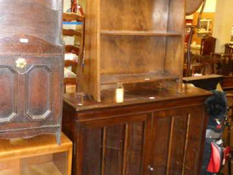 Mahogany two door china cabinet on ball and claw legs and walnut open...