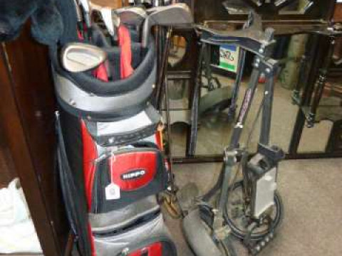 Hippo golf bag collection of golf clubs including Wilson and golf cart