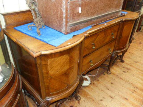 George I style walnut bow end sideboard on shell capped cabriole legs
