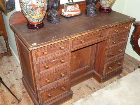 Victorian pine desk having three frieze drawers above two banks of three...