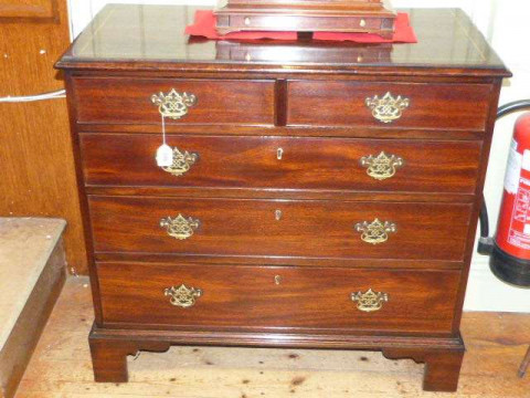 George III inlaid mahogany chest of two short above three long drawers...