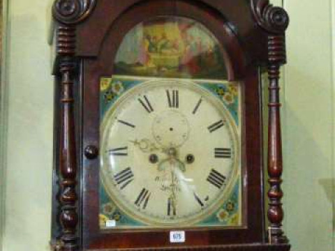 Antique mahogany eight day longcase clock having painted arched dial