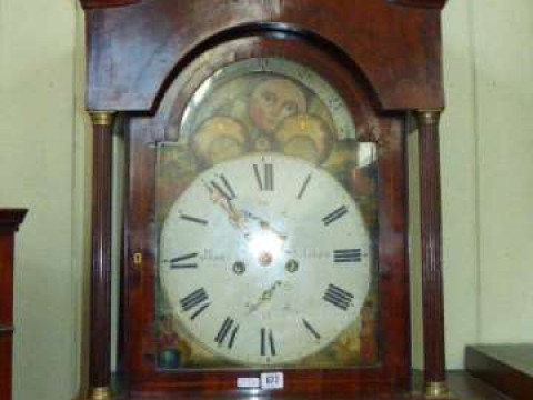 Antique mahogany eight day longcase clock having painted arched moon phase...