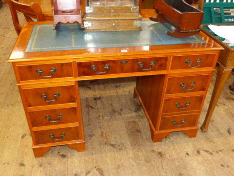 Yew eight drawer pedestal desk