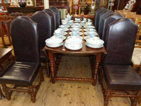 Large oak turned leg drop leaf dining table and eight high arched back...