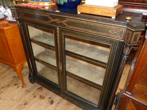 Victorian walnut, ebonised, inlaid and ormolu glazed two door side cabinet