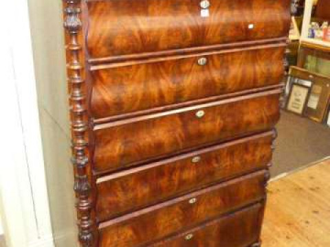 19th Century Beidermeier style mahogany six drawer tallboy on turned feet