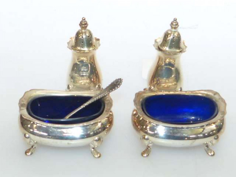 Four silver cruet pieces