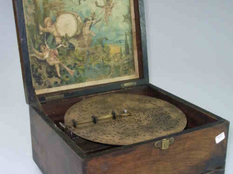 Polyphon in Inlaid Rosewood Case with Approximately 37 Metal Discs
